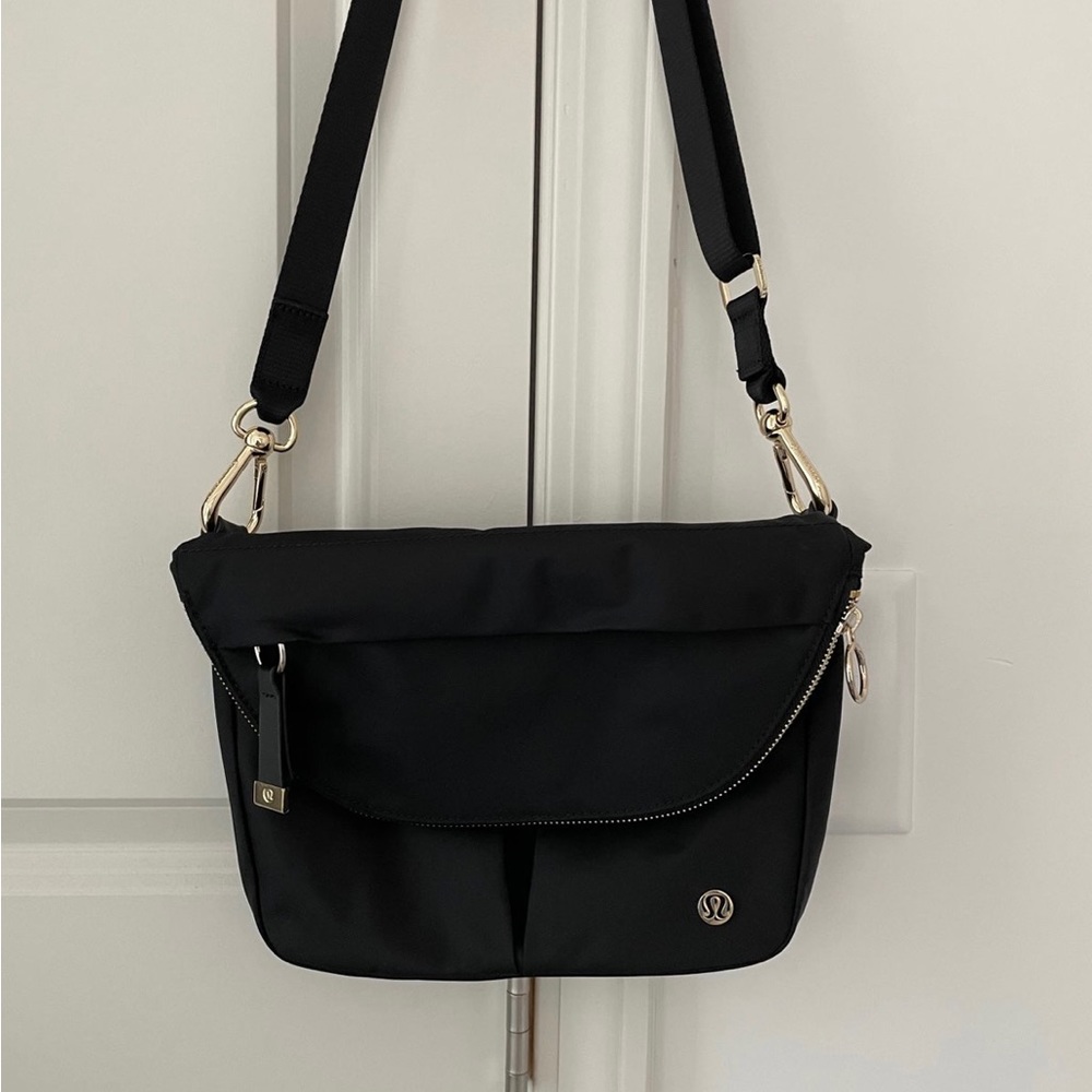 Black and gold All Night Festival Bag